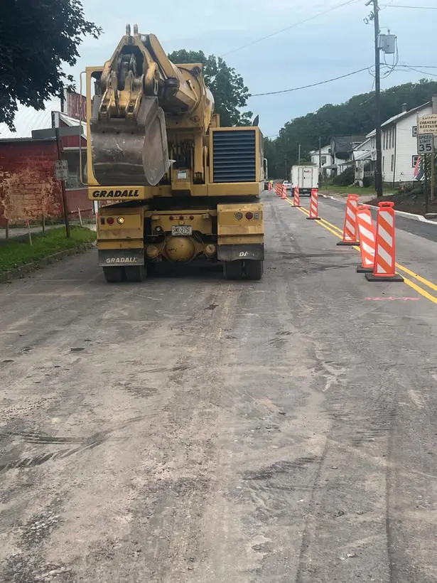 Active construction zone with heavy equipment