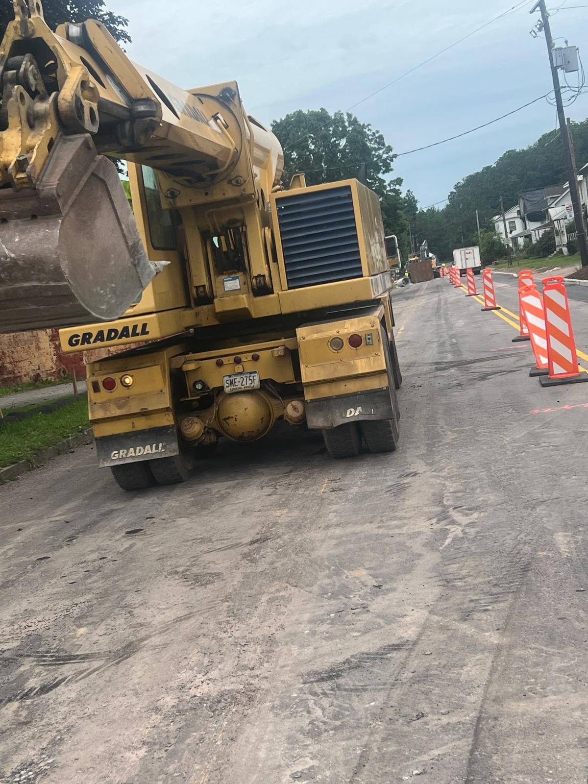 Road construction with equipment and traffic control