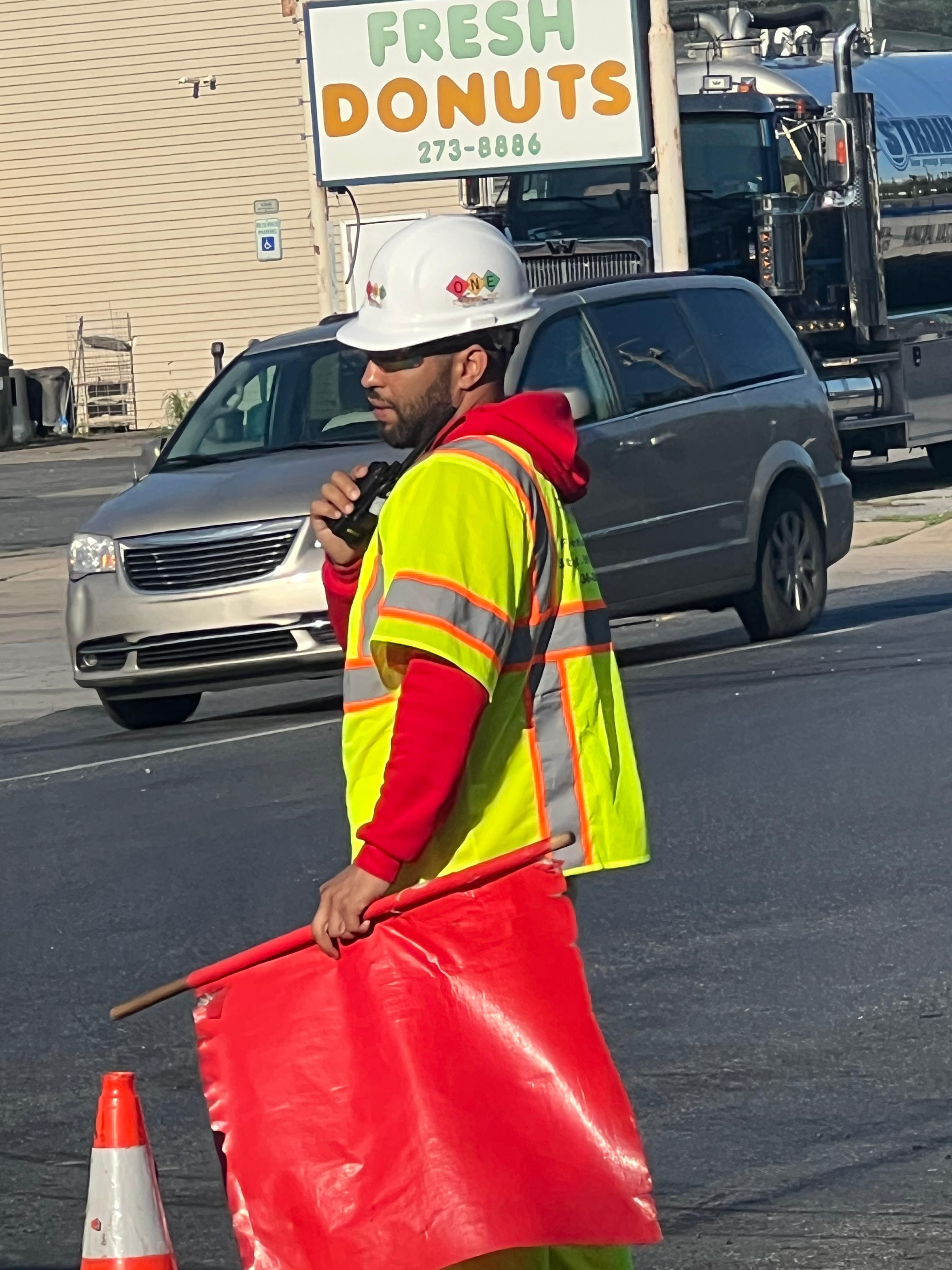 Crew member coordinating with radio