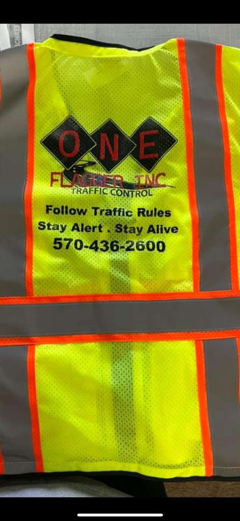 One Flagger Inc team photo in safety gear